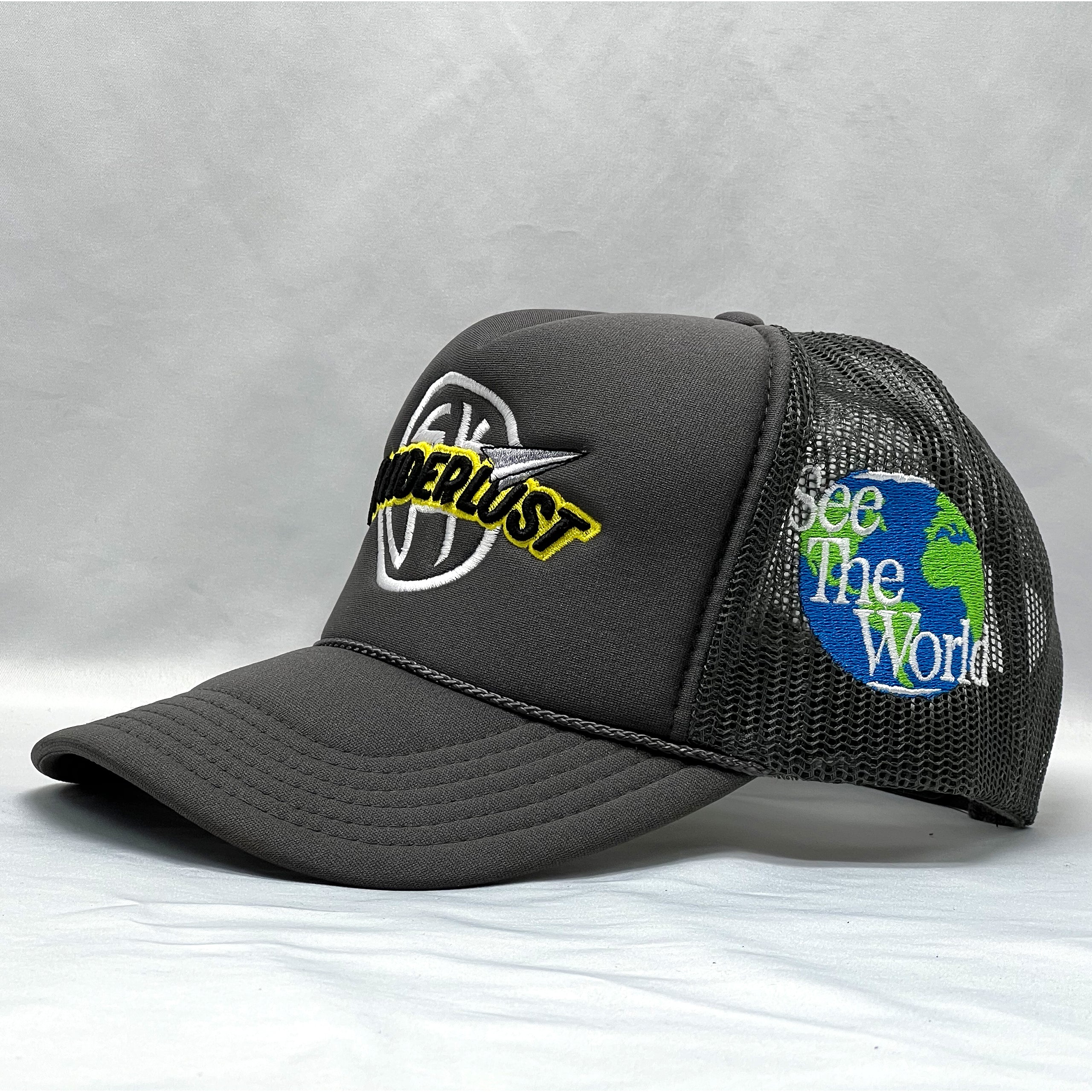 The WANDERLUST Trucker Hat (Charcoal)