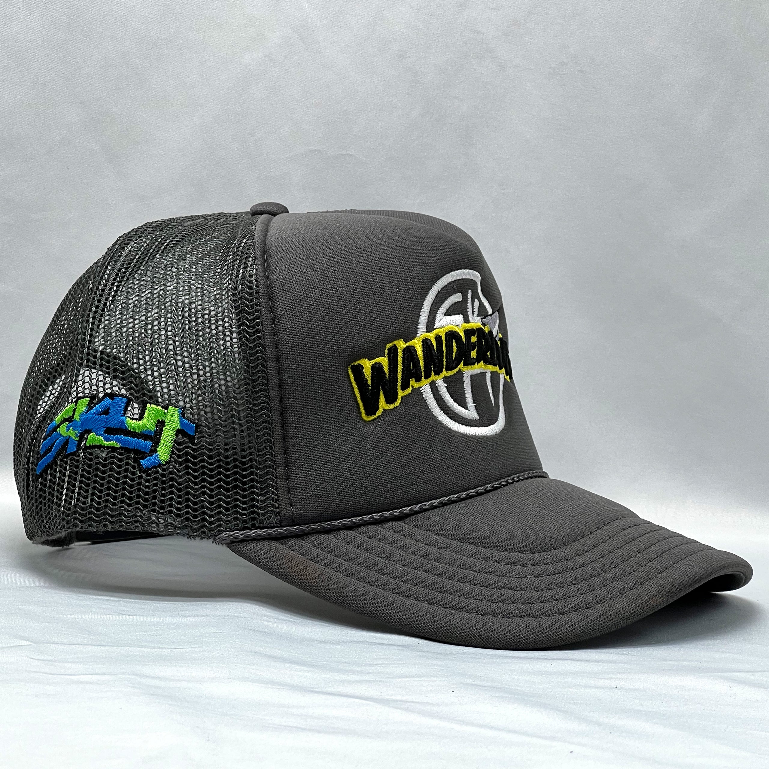 The WANDERLUST Trucker Hat (Charcoal)