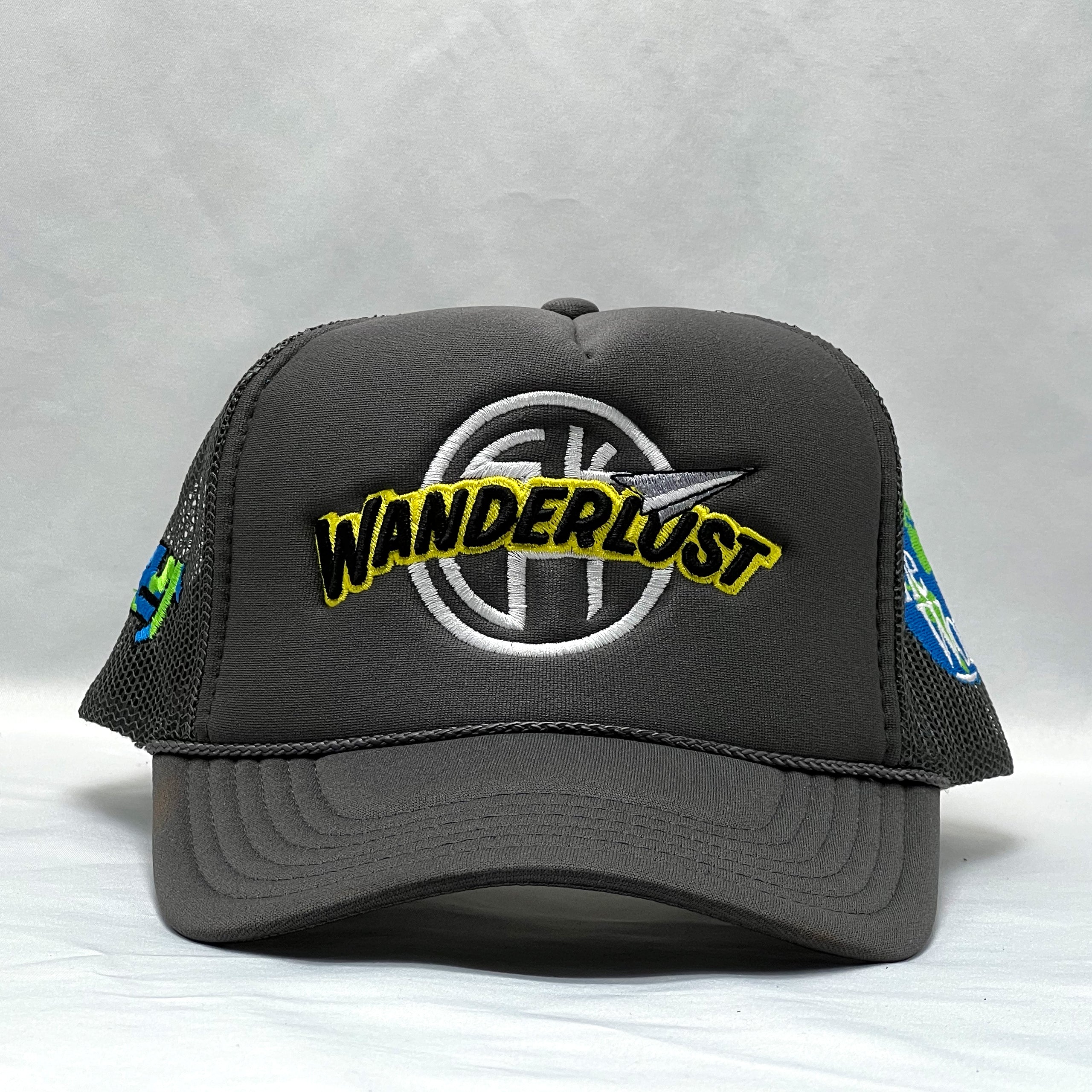 The WANDERLUST Trucker Hat (Charcoal)
